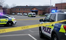 Memphis school parking lot with police presence