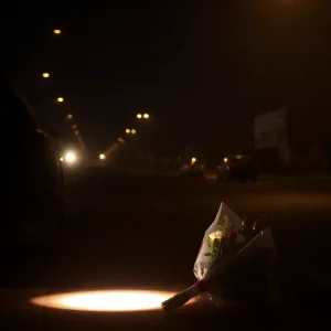 Crime scene in Memphis with memorial flowers