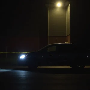Police presence near an apartment complex following a carjacking