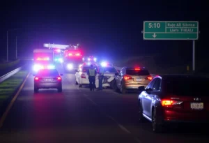 Scene of a multi-vehicle accident on Highway 385 with emergency response