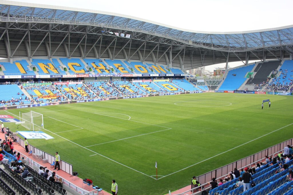 Soccer stadium with pitch and stands