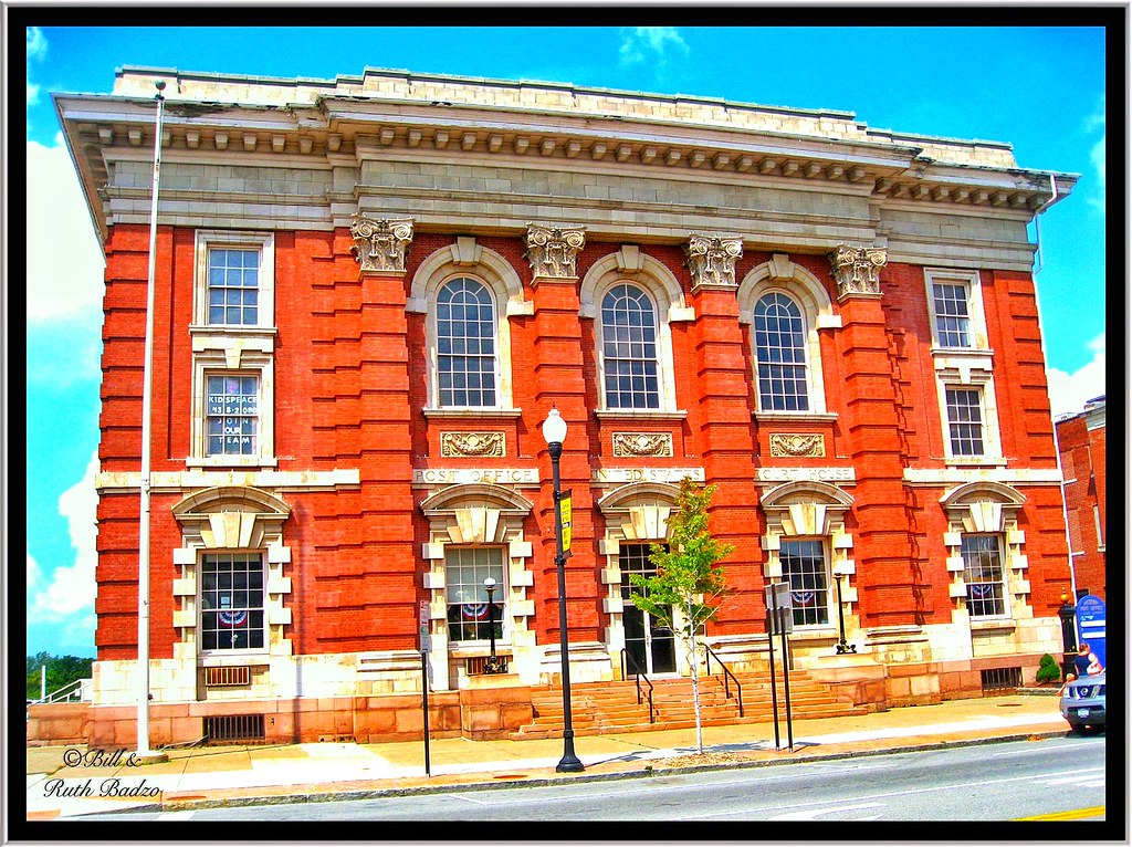 City hall exterior columns and entrance on a downtown street
