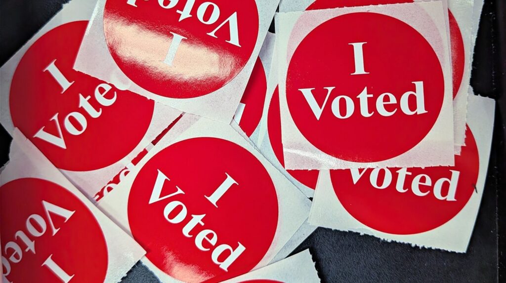 Pile of red I Voted stickers