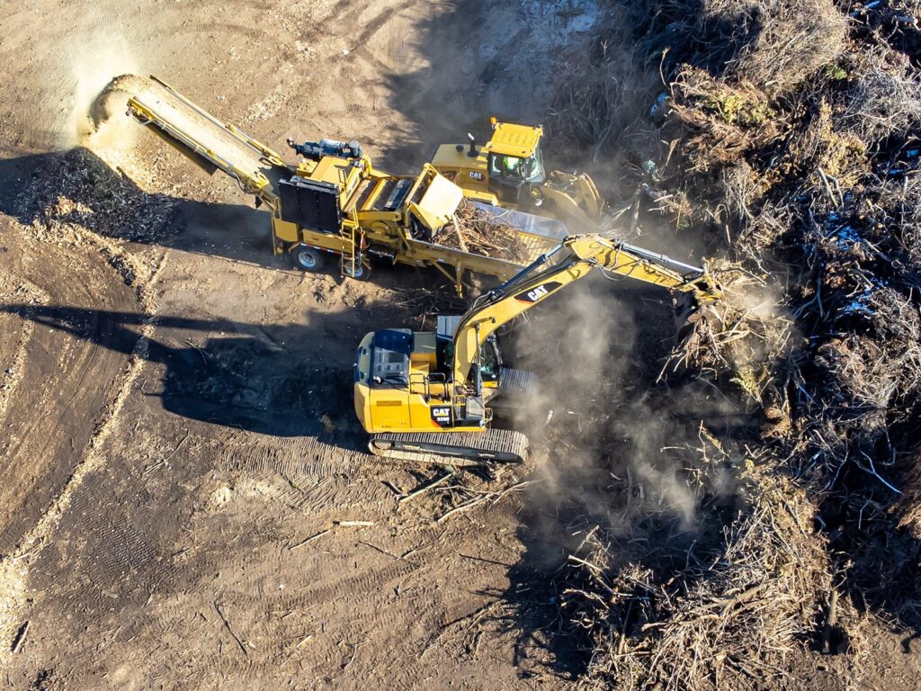Excavator digging on a work site