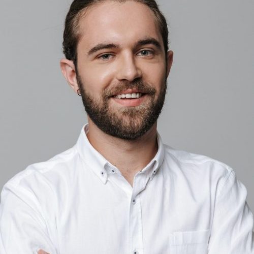 optimistic-positive-handsome-bearded-man-e1629010214804.jpg